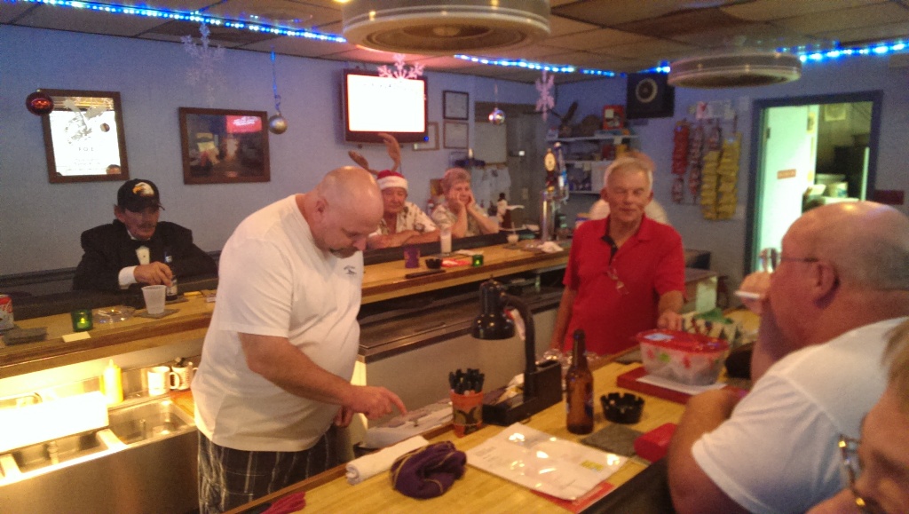 12-21-2013 Tommy helps Gil with beverage prices and Bob enjoys this time bartending